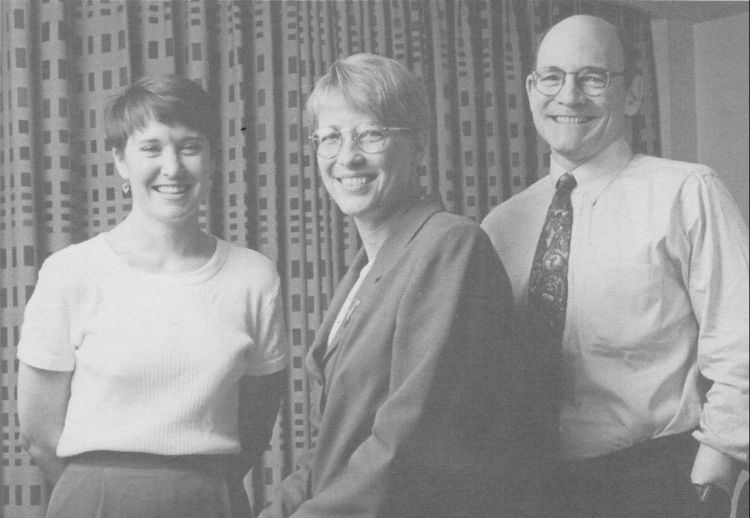 Bush Leadership Fellows Program staff Martha Lee (left) and John Archabal (right) in 1997, with Bush Fellow Susan Showalter ('83), a longtime consultant to the program.