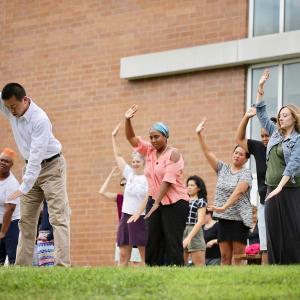 Yang Ye leads participants in Tai Chi lessons at the Convening event.