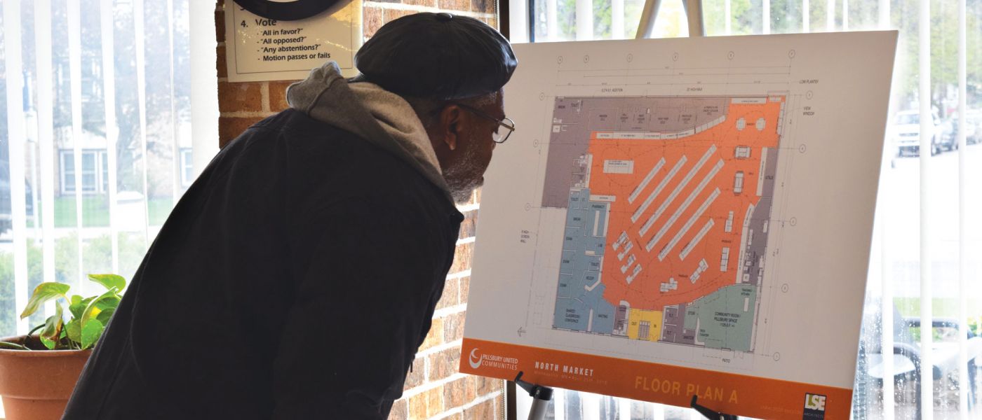 Man reviewing plans for North Market