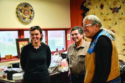 From left, Jen Ford Reedy and Jaime A. Pinkham of the Bush Foundation meet Oglala Sioux Tribal President Bryan Brewer in August 2013