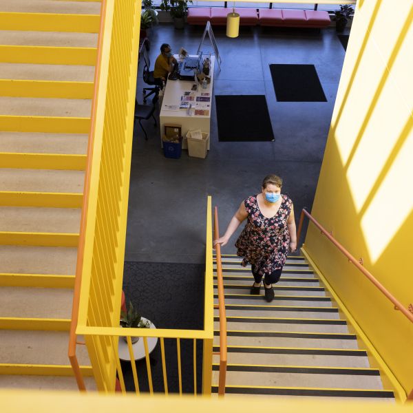 Family Tree Clinic employee Lindsey Hoskins ascends the stairs in the bright and welcoming new office.