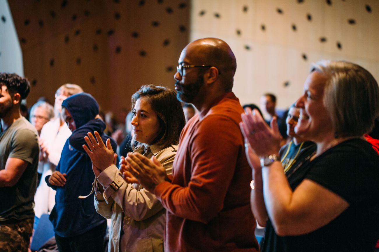 Audience members react to the youth performers at the 2019 Youth Cultural Healing Summit. 