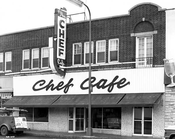 The outside of a cafe with the sign, Chef Cafe.