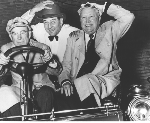 three men in a car